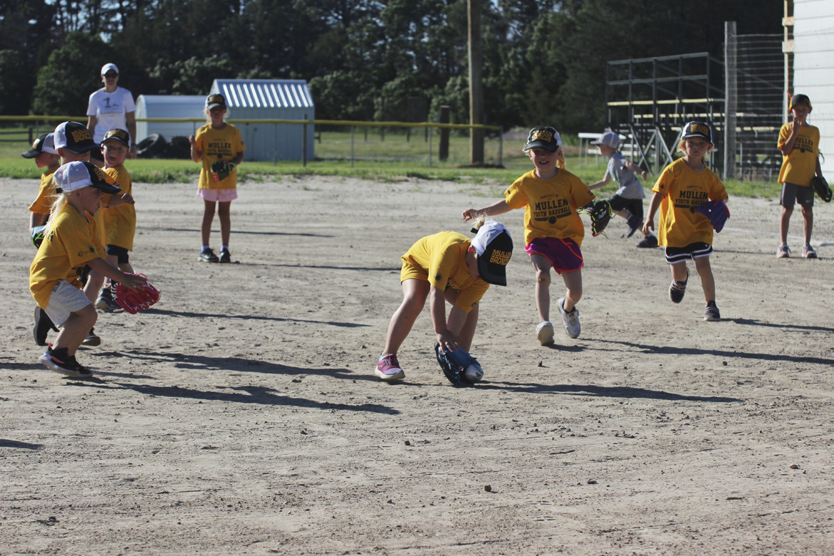 Harper Myers fields the ball during the t-ball game against Thedford on Monday, June 19, Dane Peterson