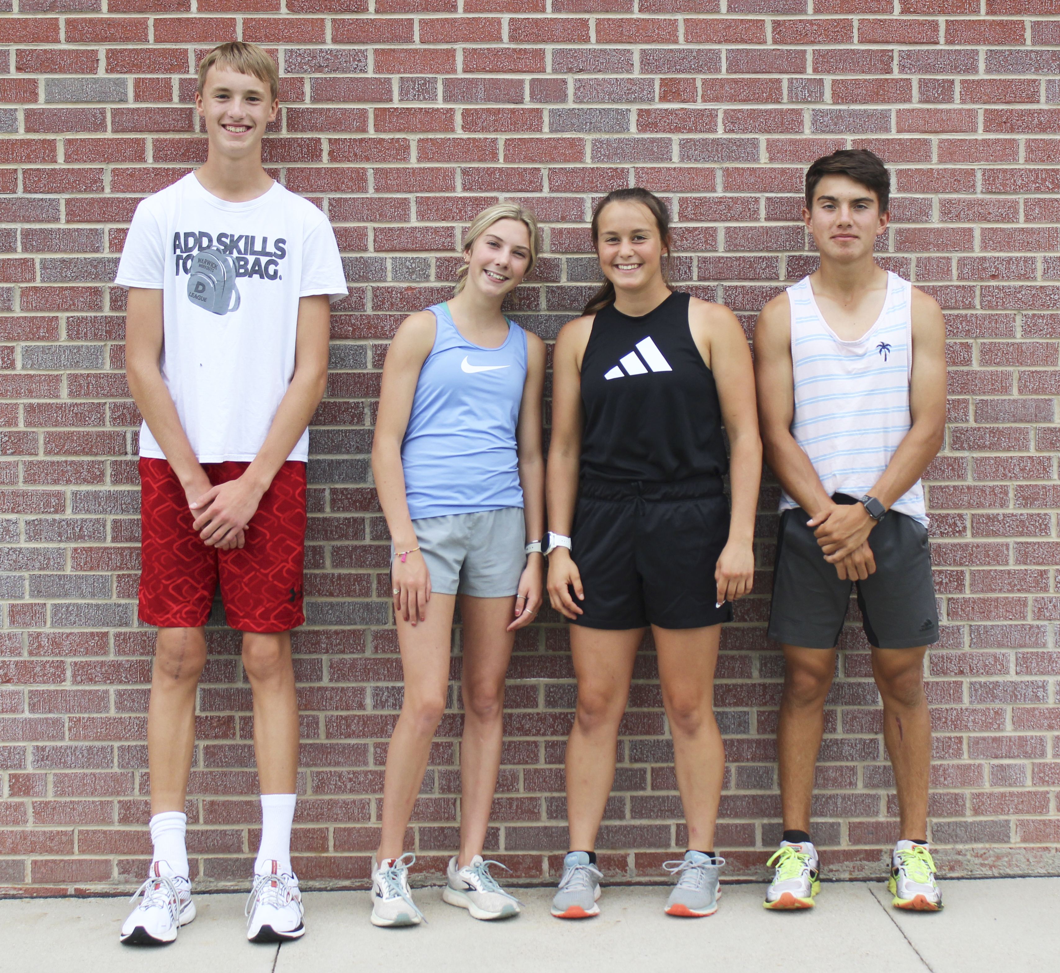 MHS Cross Country, l-r: Alex Moore, Peyton Paxton, Callie Coble, Trevor Kuncl. Gerri Peterson