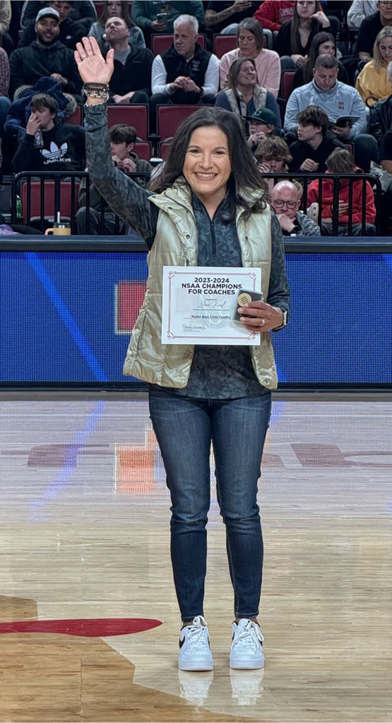 Last month the recipients of the inaugural 2023-2024 Nebraska School Activities Association Champions for Coaches award were announced. MHS cross country coach Janie Kuncl received the award for boys cross country. She received her award during the Class A Boys State Basketball semifinal game on Friday, March 8 at the Pinnacle Bank Arena in Lincoln. Congratulations! courtesy photo