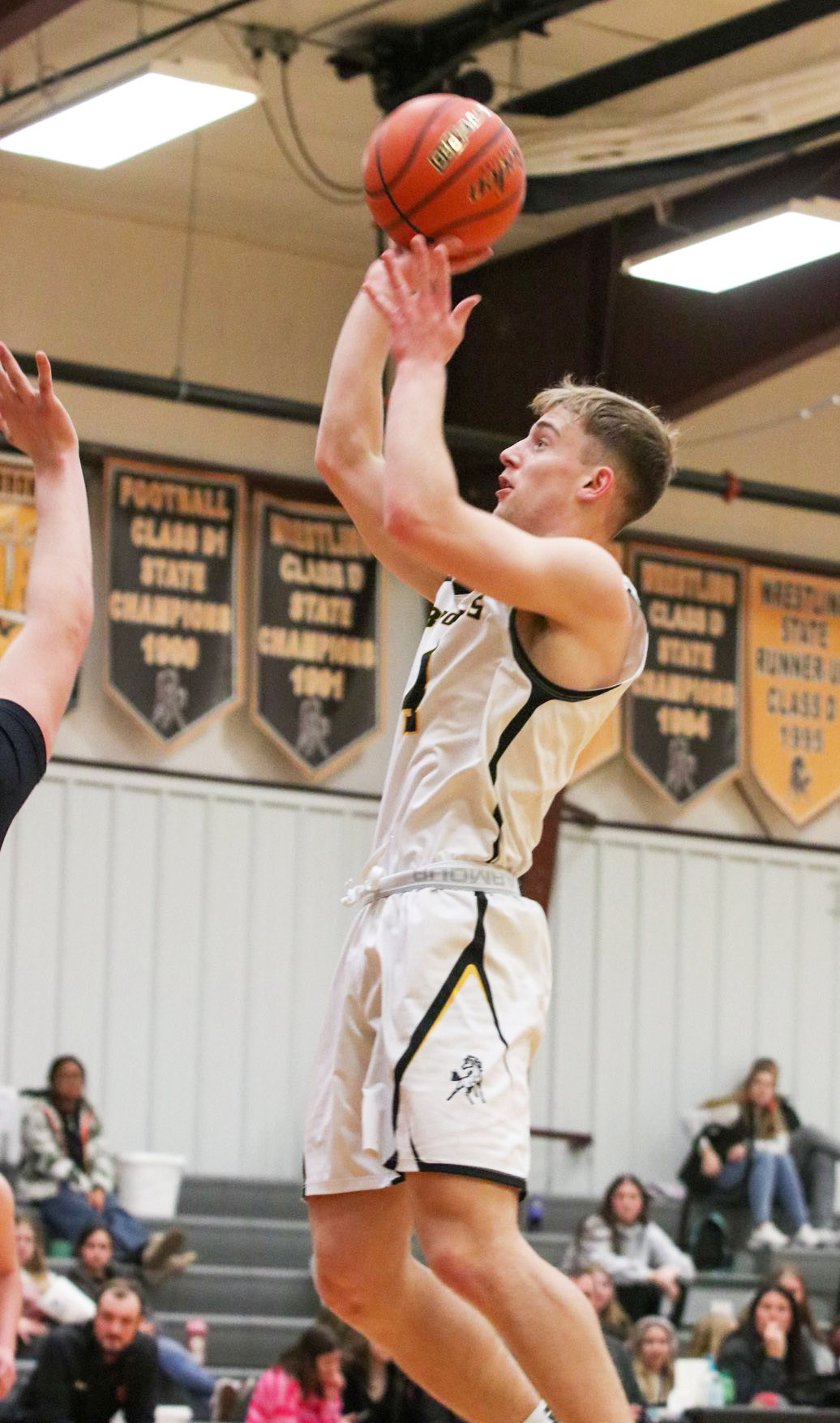 Alex Werner puts up a jump shot against Sandhills Valley. Carolee Brown Photography