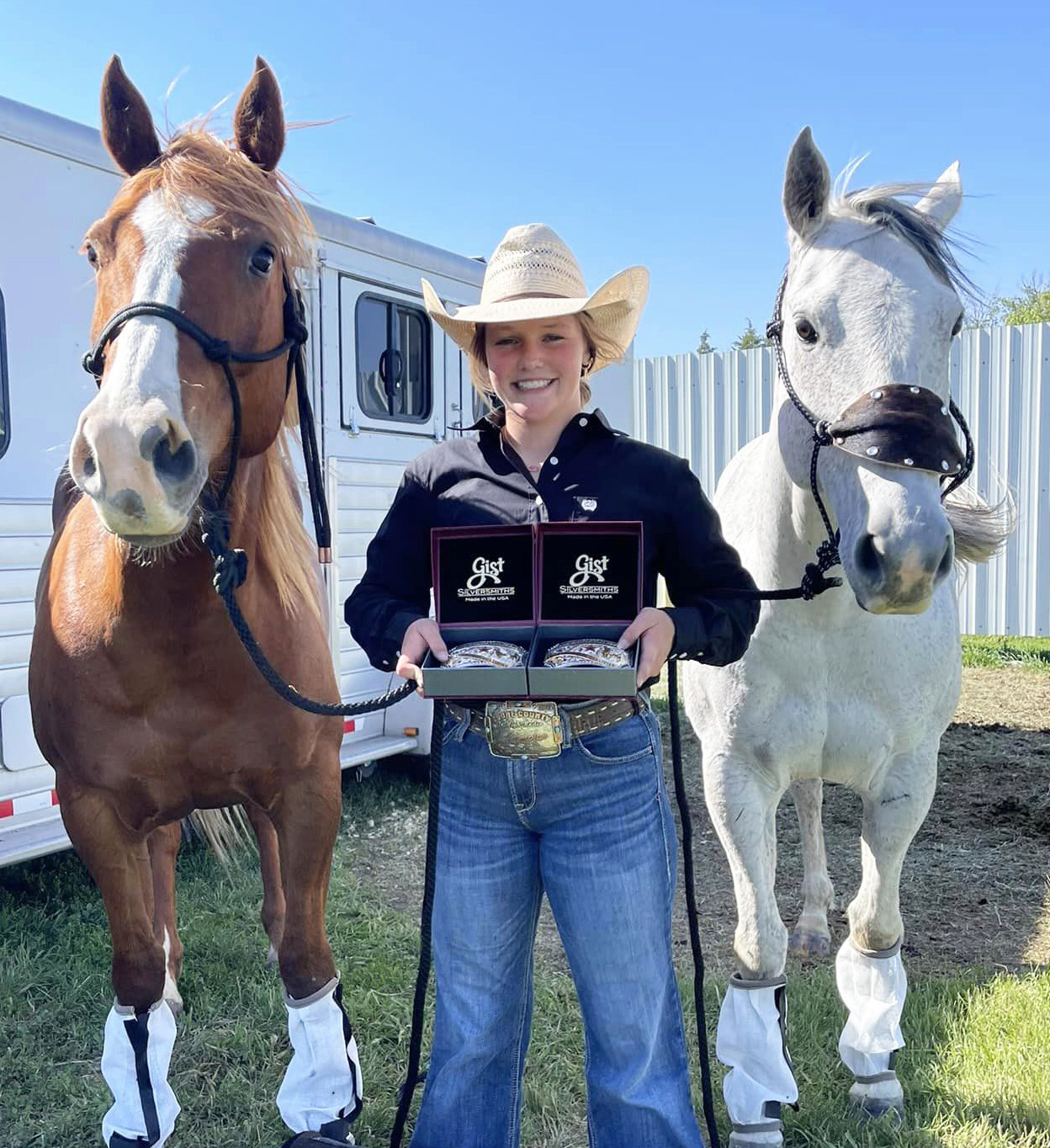 Emerson Thorberg with her National qualifier belt buckles. Kendra Thorberg