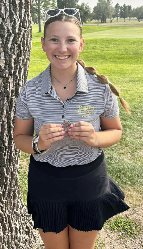 Hope Miller with her medal at last week’s golf meet. Bo Cribelli