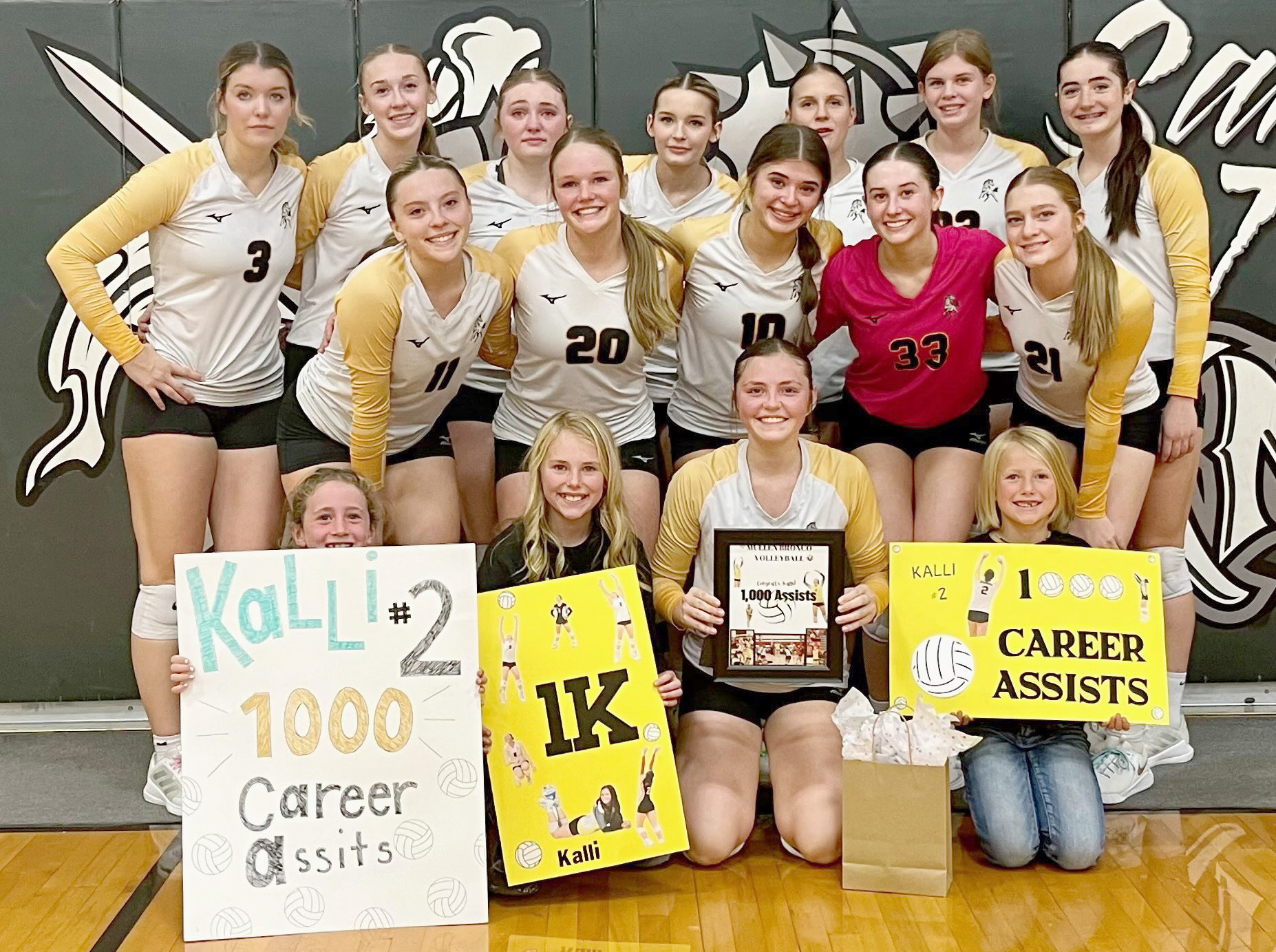 Lady Bronco sophomore setter Kalli Licking got her 1,000th assist in the sub-district final game last week. She is pictured with her teammates, back l-r: Medora DeNaeyer, Sydnee Cheever, Hayley Donohoe, Maggie Haesler, Brynne McCully, Chloe Newman, Jenna Donohoe. Middle: Izzy Hoyt, Emerson Thorberg, Ella Rice, Allie Boyer, Lola Wingebach. Front: Dailie Dent, Ayden Lee, Kalli, Fallon Lee. Sue Licking