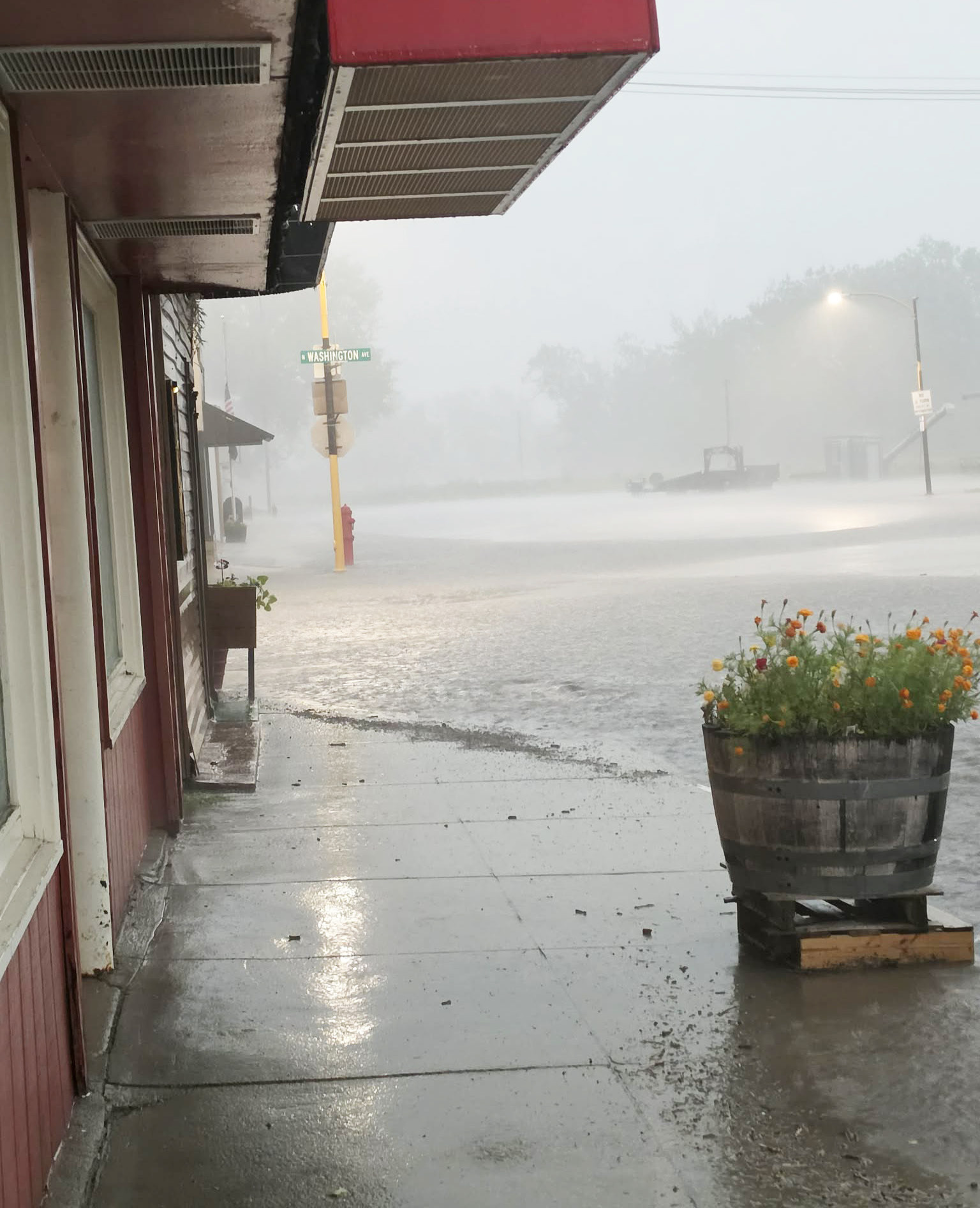 A storm blew into Mullen last Thursday, Aug. 27, with strong winds and heavy rain. Streets were briefly flooded as can be seen in this photo from Macke’s Grocery on Main Street looking east. Cassandra Gray