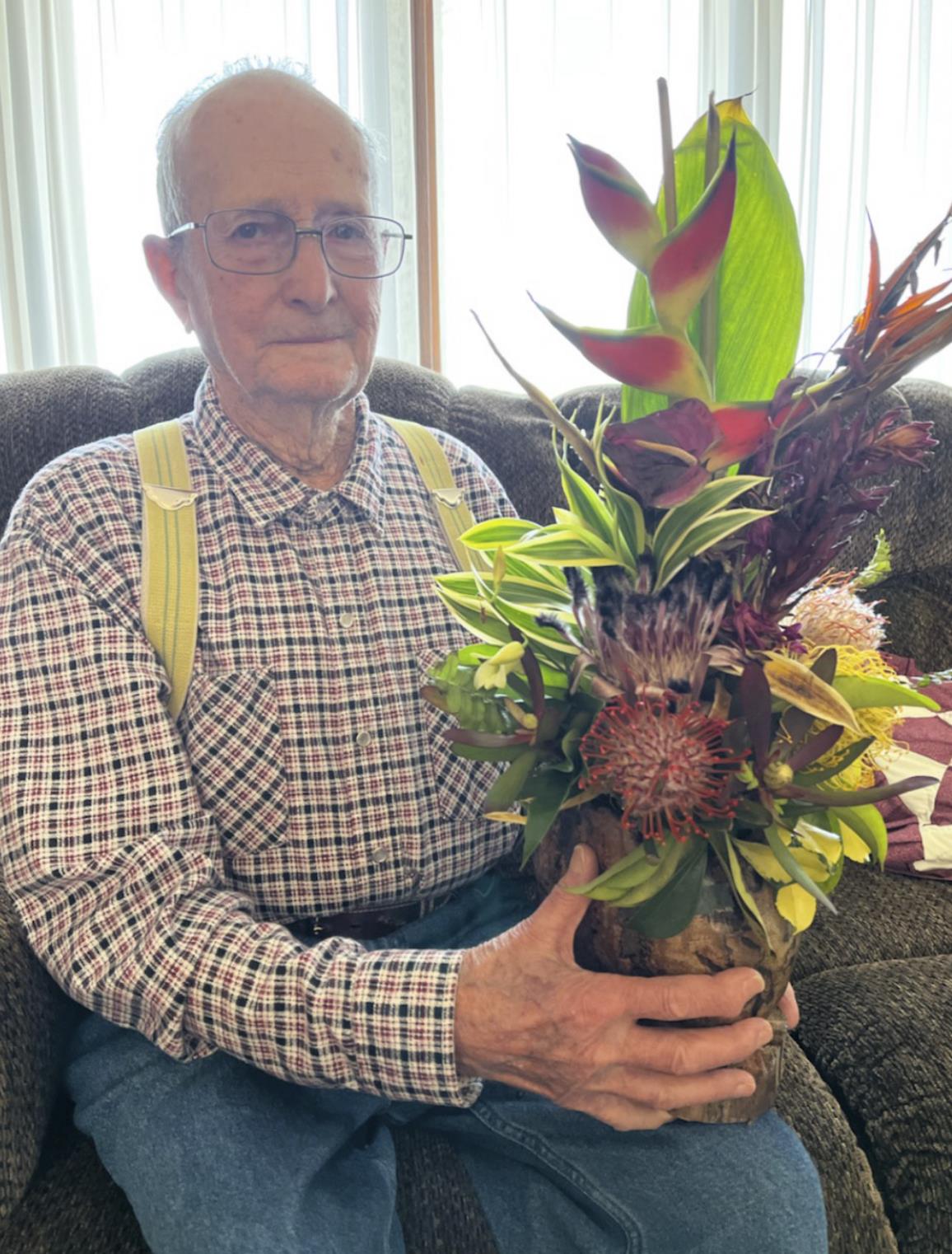 Frank Harding holds a Hawaiian bouquet that was shipped to him for his 100th birthday from his niece Rita Fischer, who was wintering in Hawaii. Frank tried encouraging the Tribune to be done running his photo by saying, “I’ve had my photo in the paper enough over the years.” But the Tribune made no promises! Gerri Peterson