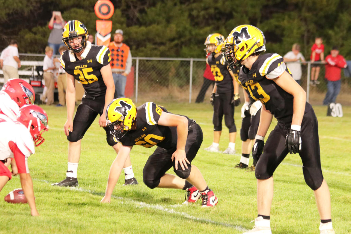 L-r: Cooper Walker, Daniel Wright and Jaylon Forsen on defense last Friday against Brady. Carolee Brown