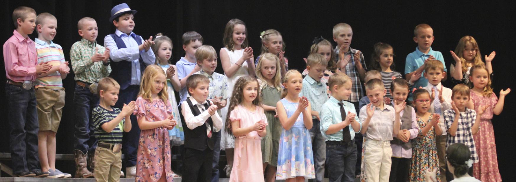 Kindergarten and 1st grades, pictured back, l-r: Cylas Dent, Jackson Newman, Duke Miller, Hunter Gray, Keira Kearns, Samuel Hessin, Logan Moore, Kendall Phipps, Avery Vinton, Jedd Kraus, Finley Mundorf, Caleb Deibler, Taylor Cash. Middle: Gus Wingebach, Ayden Lee, Kyler Marsh, Tylee McClain, Cooper Phillips, Charley Zimmerman. Front: Tripp Jewell, Elle Gracey, Zach Hicks, Lillian Ericksen, Emri Dent, David Byrd, Luke Cox, Tuff Pettit, Natalee Walker, Jaxyn Evans.