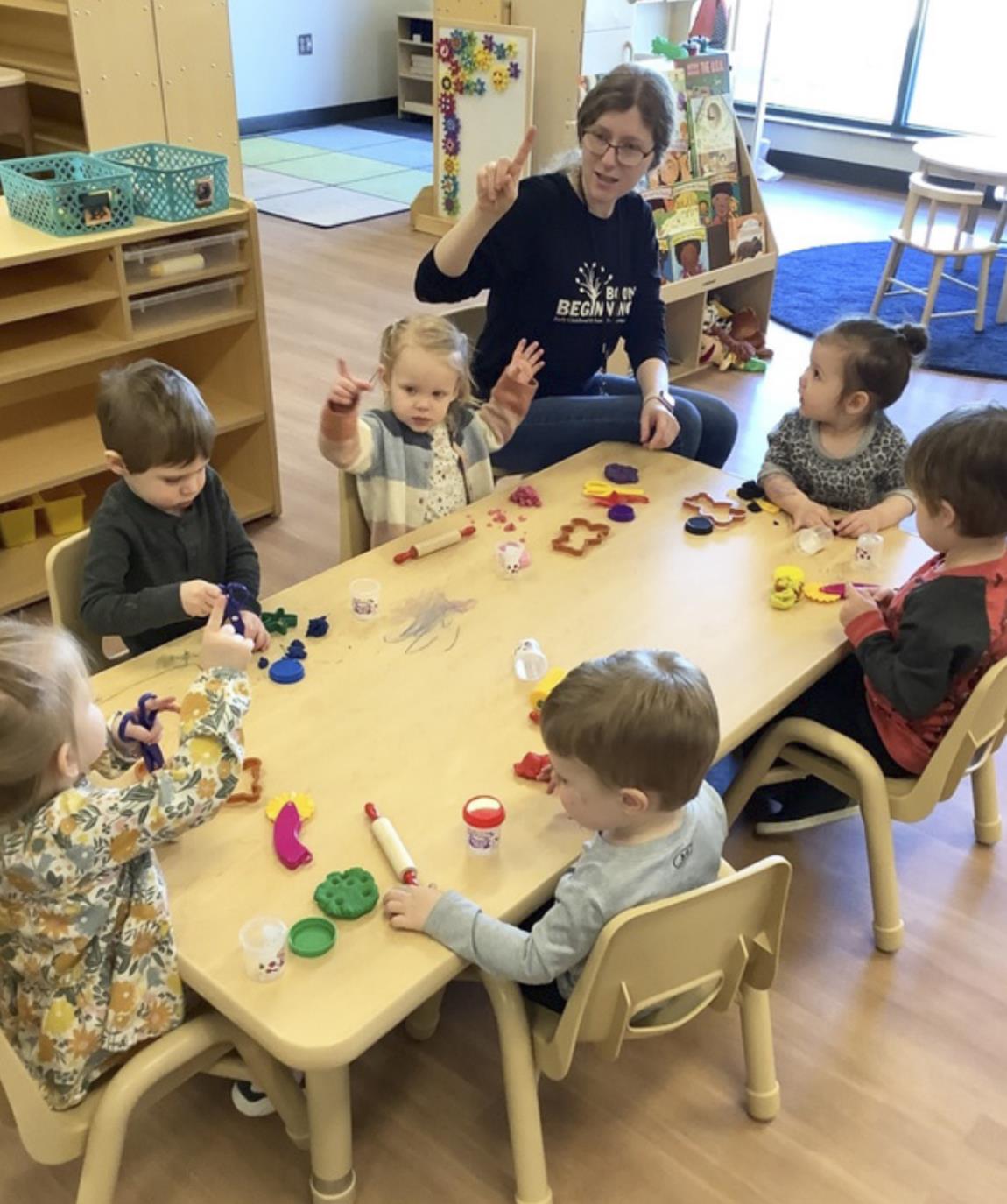 Teacher Ashley Gutierrez with her young students in a classroom at Boone Beginnings in Albion. Nearly two-dozen children are enrolled at the early childhood center, which opened in November. Center enrollment will soon expand – eight more babies, some of whom haven’t yet been born, are already signed up to receive child care at Boone Beginnings. Boone Beginnings