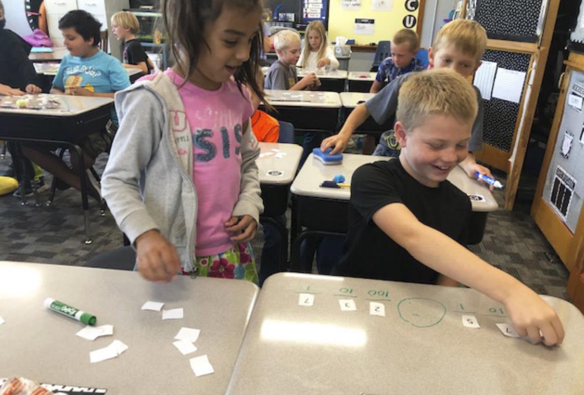 2nd graders compare 3-digit numbers