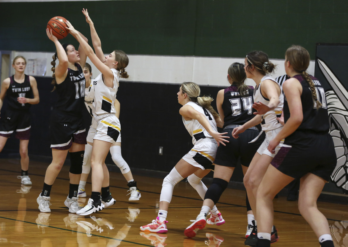 Erika Massey tries to prevent a Twin Loup shot last Monday.