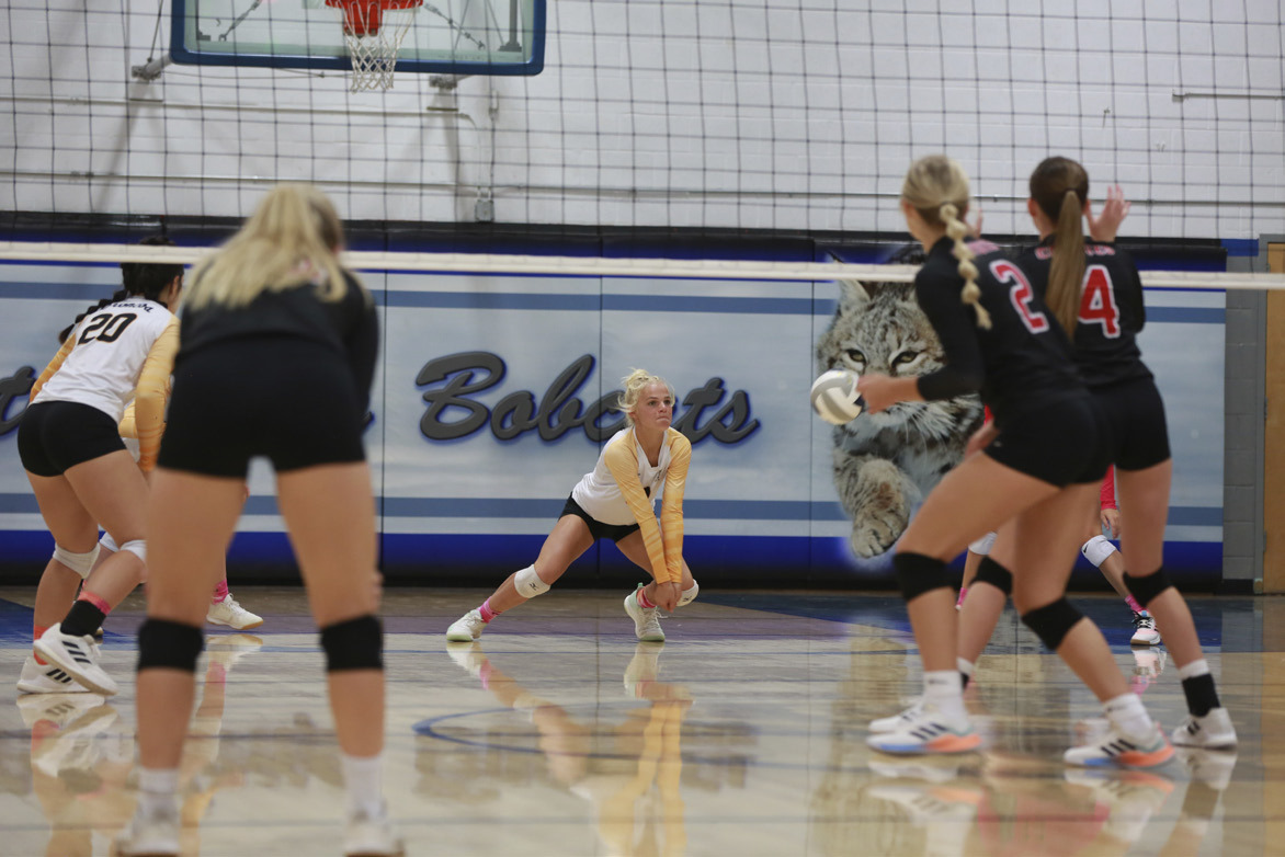 Tierston Moore with a dig last Tuesday at the triangular in Arnold. Megan Andersen