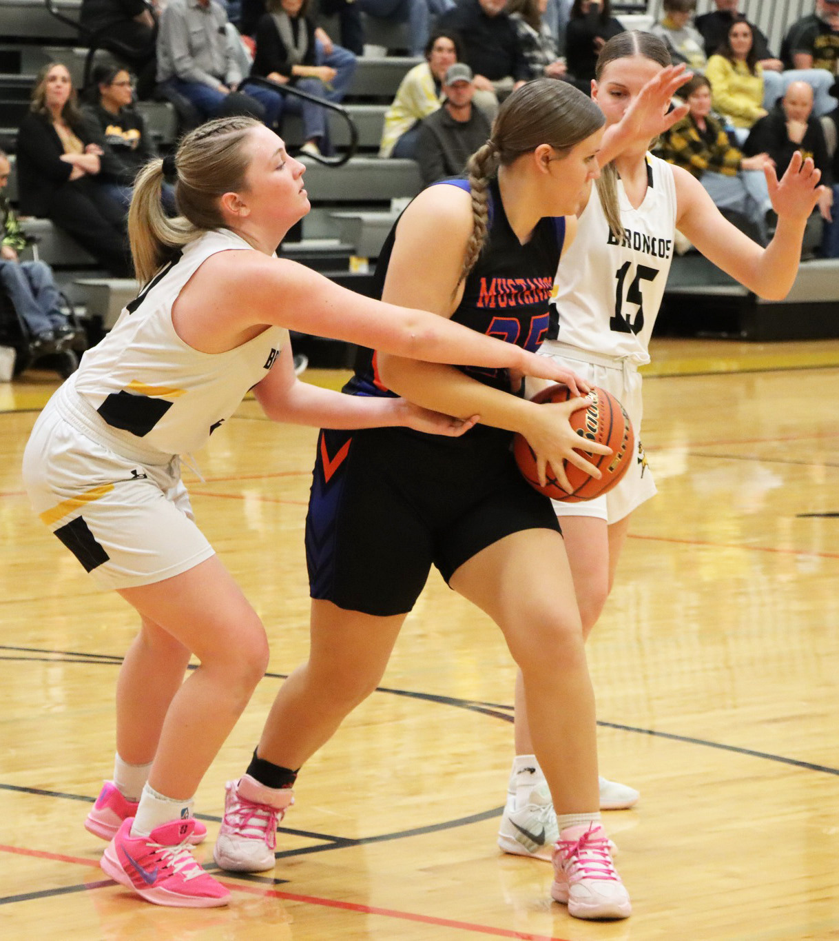 Hayley Donohoe (left) and Brynne McCully fight for the ball against Gordon-Rushville last Thursday. Sue Licking