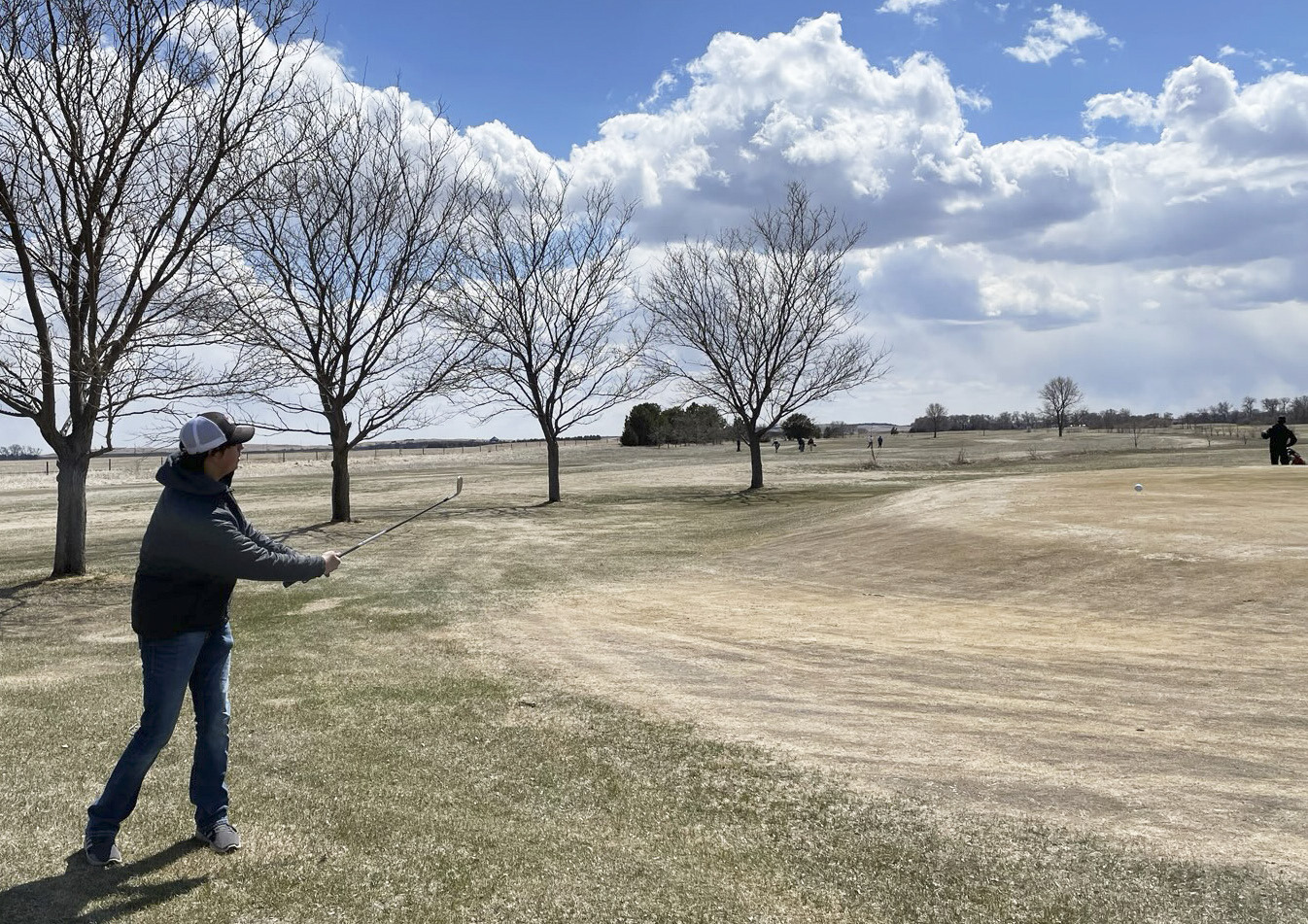 Jarren Forsen chips his ball onto the green last week in Arnold. Clint Svoboda