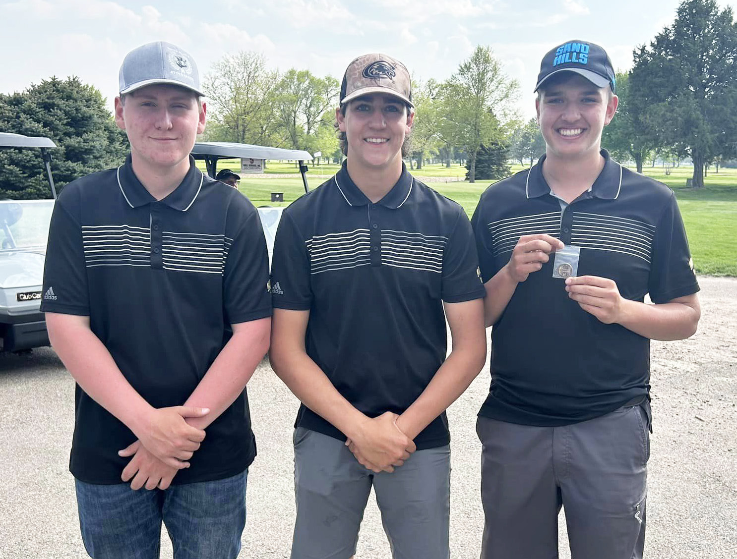 L-r: Corben Kissire, Jarren Forsen and State Golf qualifier Jacob Walker at Districts. Mary Jo Walker