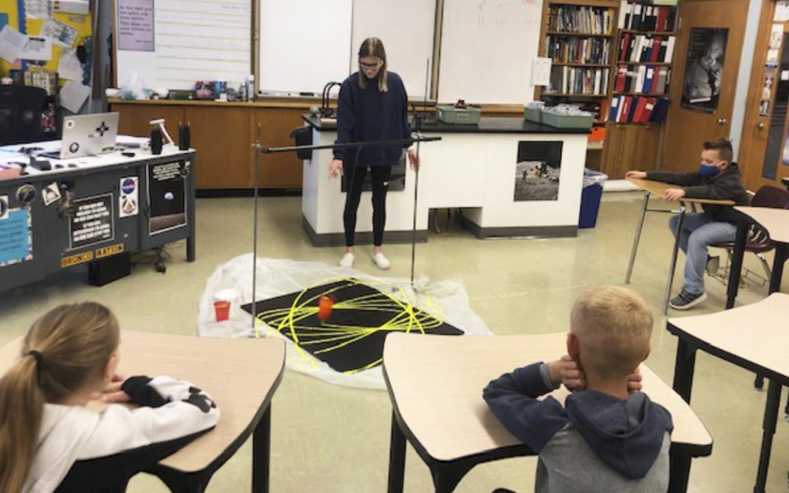 MHS senior Josey French taught the students about pendulums. Emily Brown