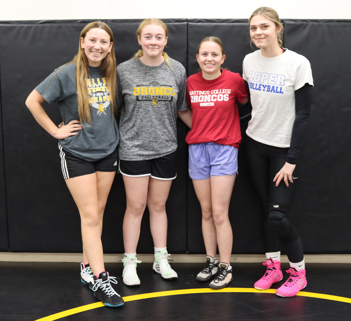 Lady Broncos on Mullen High School’s first-ever girls wrestling team, l-r: Hope Miller, Kassidy Cheever, Audrabell Werth, Georgia Wingebach. Gerri Peterson