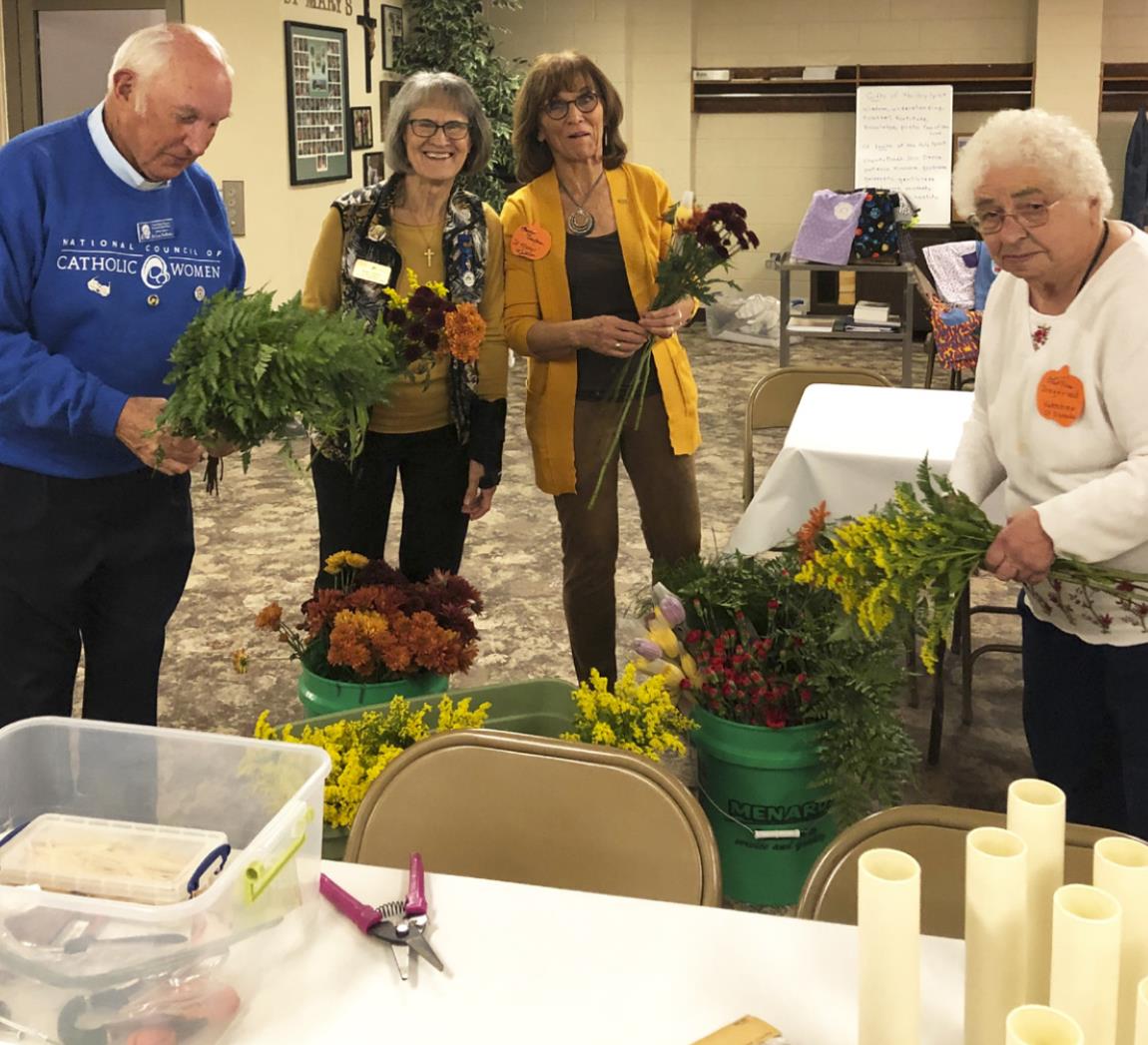 Pictured l-r: Father Lou Nollette, Susan Johnson, Marylin Ericksen, Martha Sigfried. courtesy photo