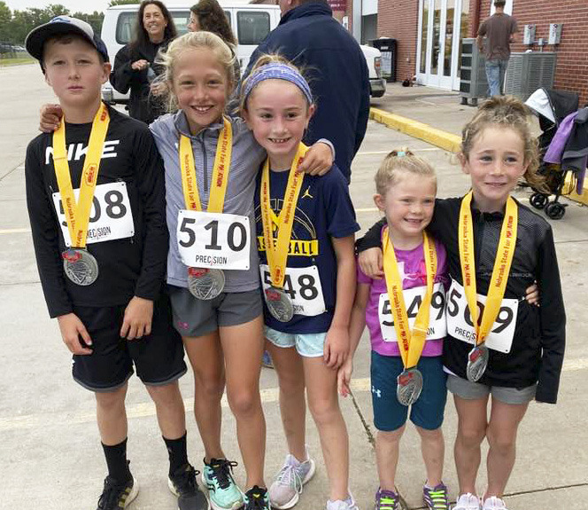 Mullen was well represented at the Nebraska State Fair races on Saturday, Aug. 26. Pictured left to right are the youth who competed in the 1 Mile - Cylas Dent (1st overall), Emri Dent (4th overall, 1st female), Avery Vinton (7th overall, 2nd female), Meyer Vinton and Dailie Dent. In the Marathon Relay, the Sandhillers team consisting of Tara Call, Callie Vinton, Brynn Burney and Kay Dent won the female division and placed 6th overall. Kay Dent