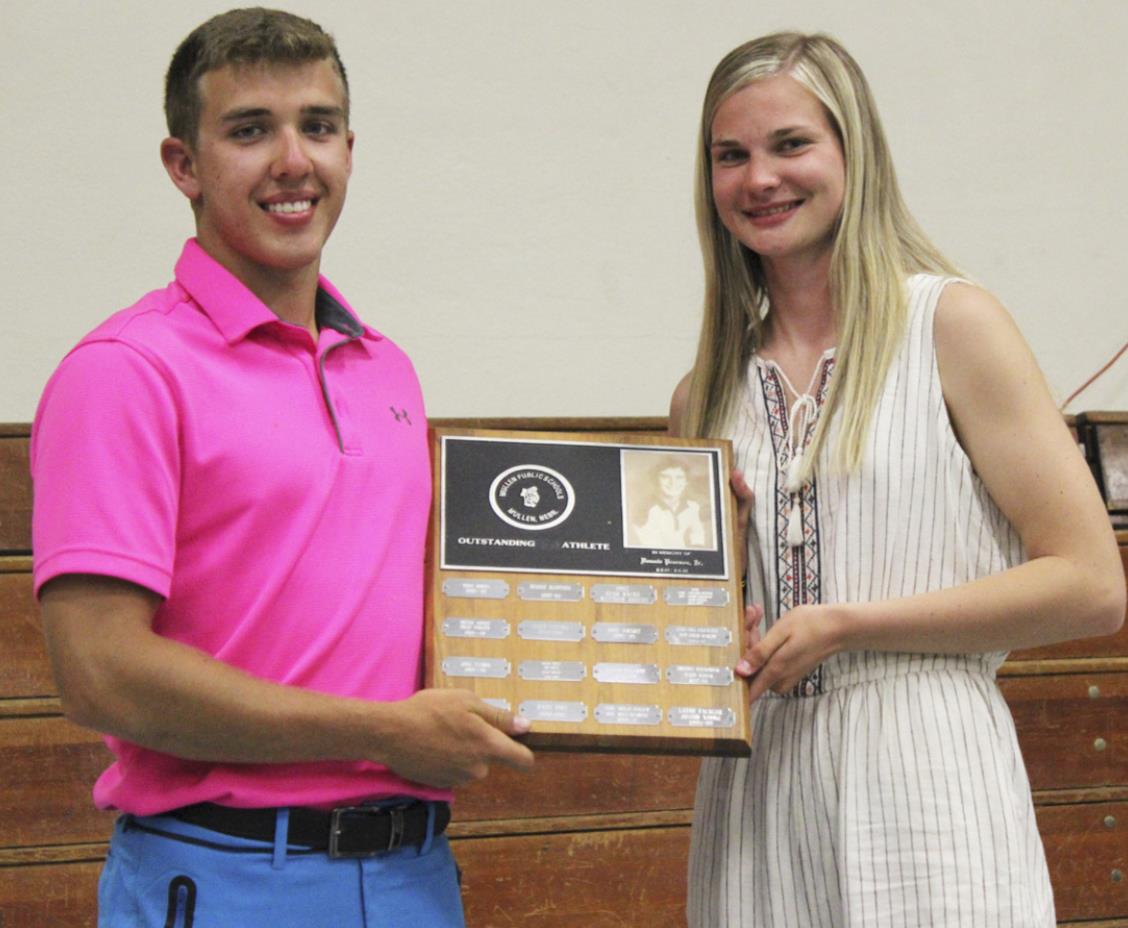 The Donnie Pearson Memorial Award is presented to outstanding senior female and male athletes every year. The 2021 recipients are pictured to the left - Brendon Walker and Samantha Moore.