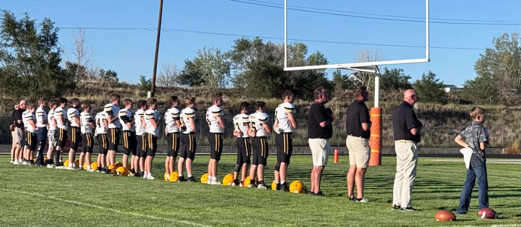 The Bronco football team during the national anthem at Bayard last Friday. Carolee Brown Photography