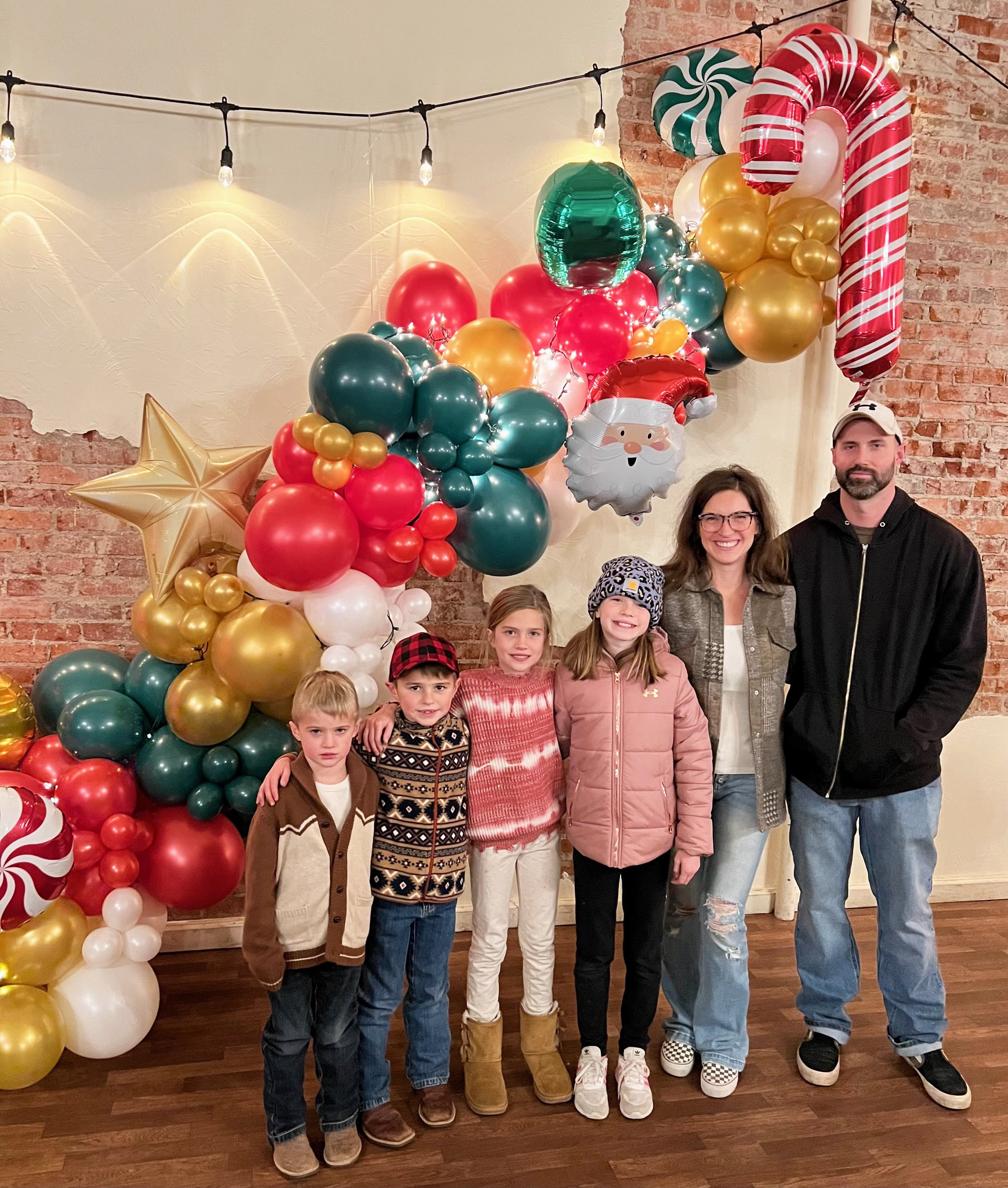 The Seeley family is pictured in front of one of their creations at Christmas Parade of Lights last year in Alliance, l-r: Tate, Brogan, Madelyn, Clara, Meg and Jake. courtesy photos