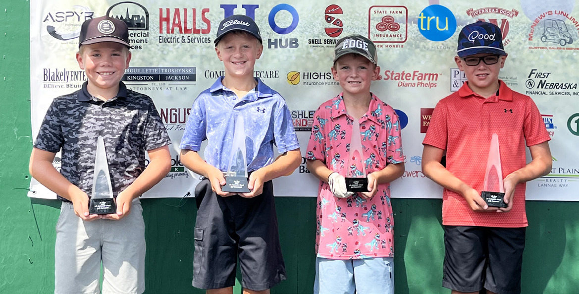 Winners of the Boys 7-9 flight stand on the stage last Tuesday following the final day of play at the 2025 Junior Ambassador Classic at Rivers Edge Golf Club in North Platte. Pictured l-r: 1st - Cooper Rippen, McCook; 2nd - Carter Schwartz, Kearney; 3rd - Cooper Peers, Mullen; 4th - Aric Sharp, McCook. Hank Blaylock, Scottsbluff, placed 5th. courtesy photos