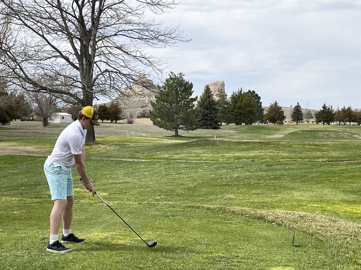 Right: Ethan Hardin gets ready to tee off at Bridgeport last week.