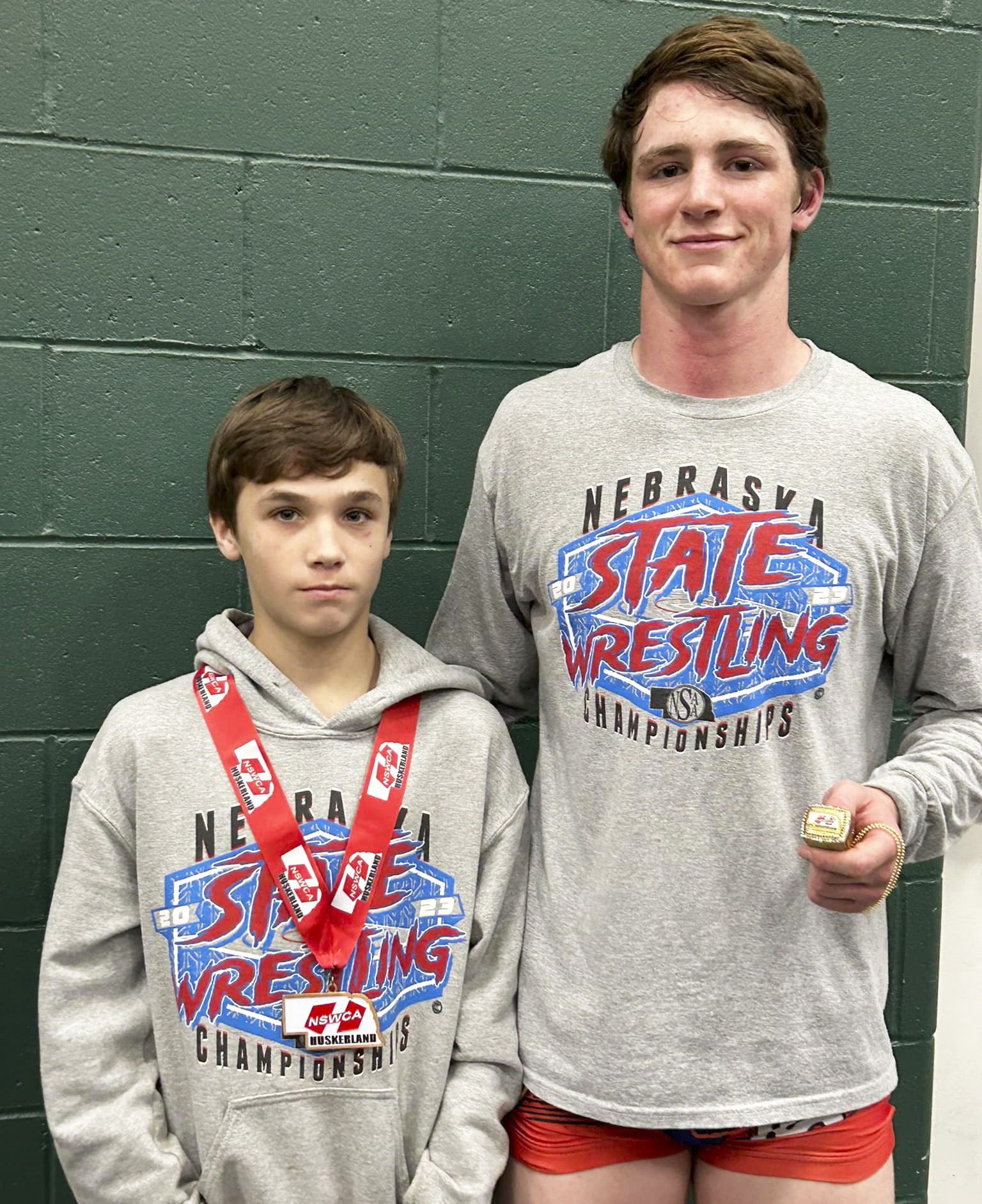 Gracey, Pettit win wrestling medals