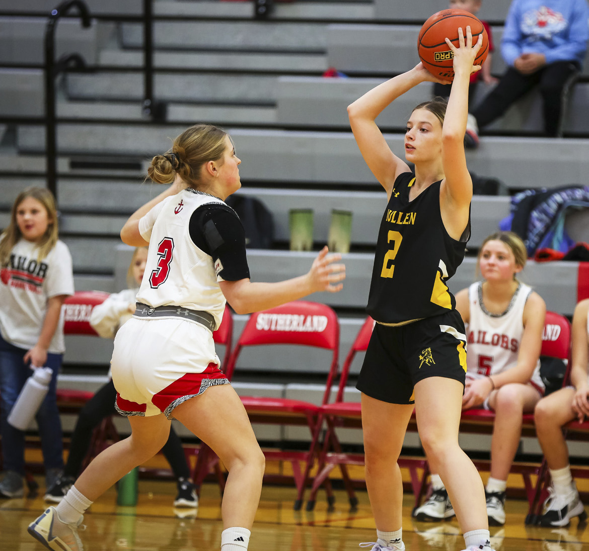 Erika Massey looks for a teammate to pass to in Sutherland. Megan Andersen