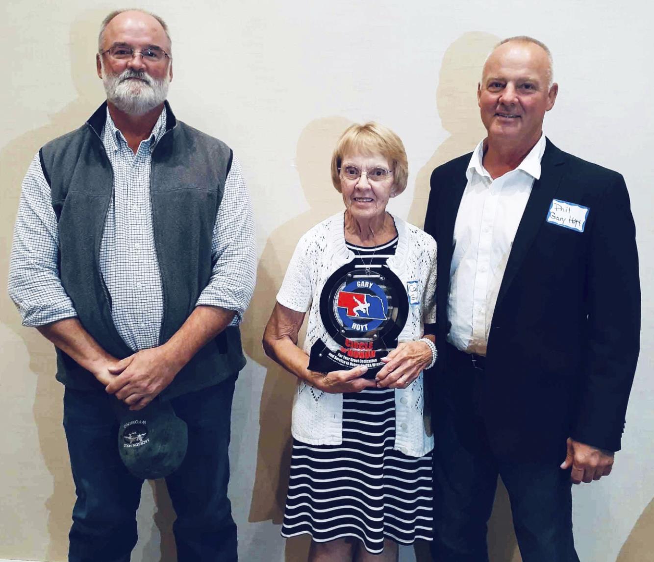 Receiving the Circle of Honor award in Gary Hoyt’s honor were his wife Carolyn Hoyt and sons Todd (left) and Phil Hoyt. courtesy photo