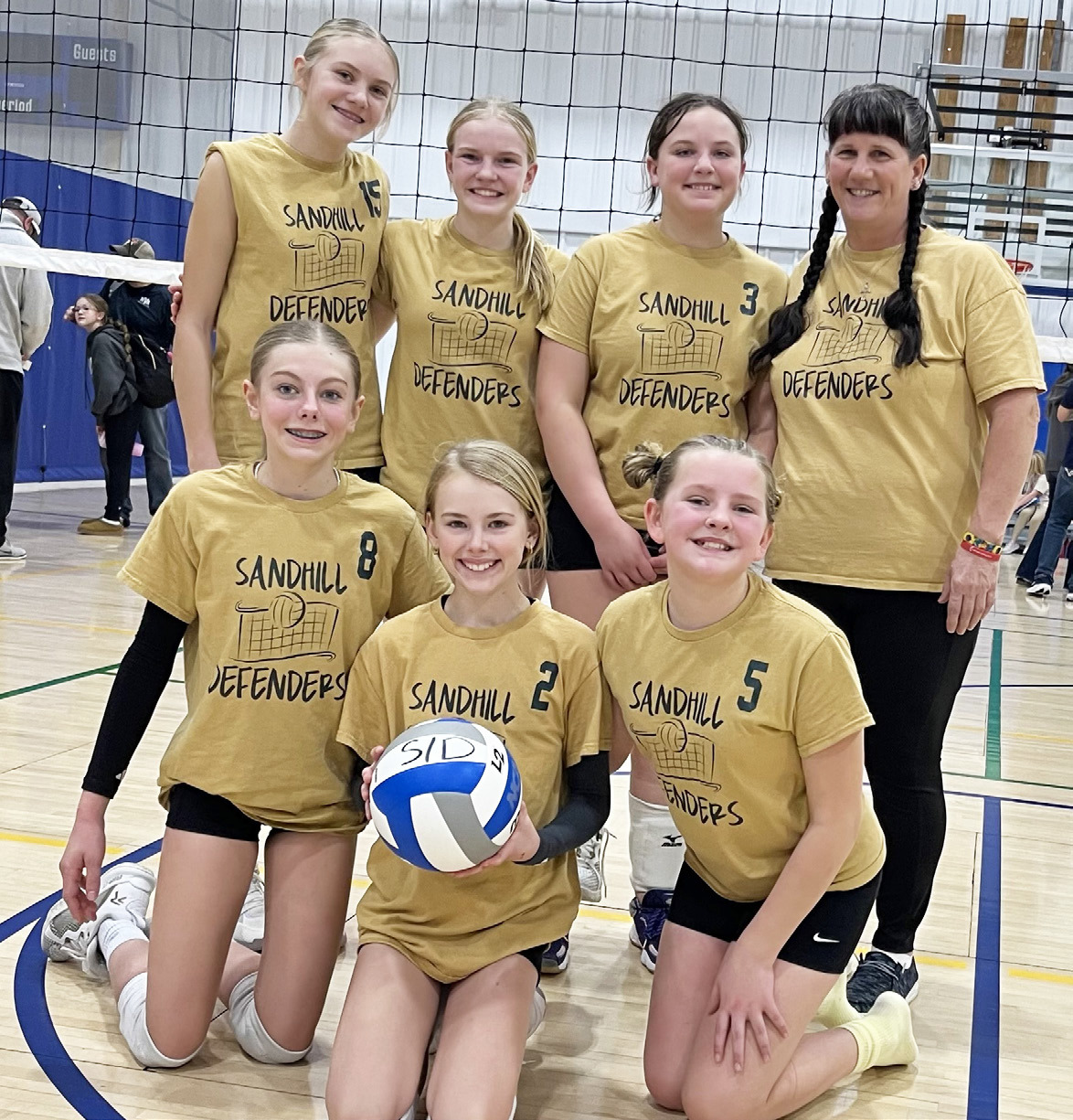 Sandhill Defenders 13U team, back l-r: Hadley Marsh (13), Ava Walz (13), Lilly Morrow of Dunning (12), Coach Barb McIntosh. Front: Kendall Phipps (12), Ayden Lee (12) &amp; Ella Walz (11).