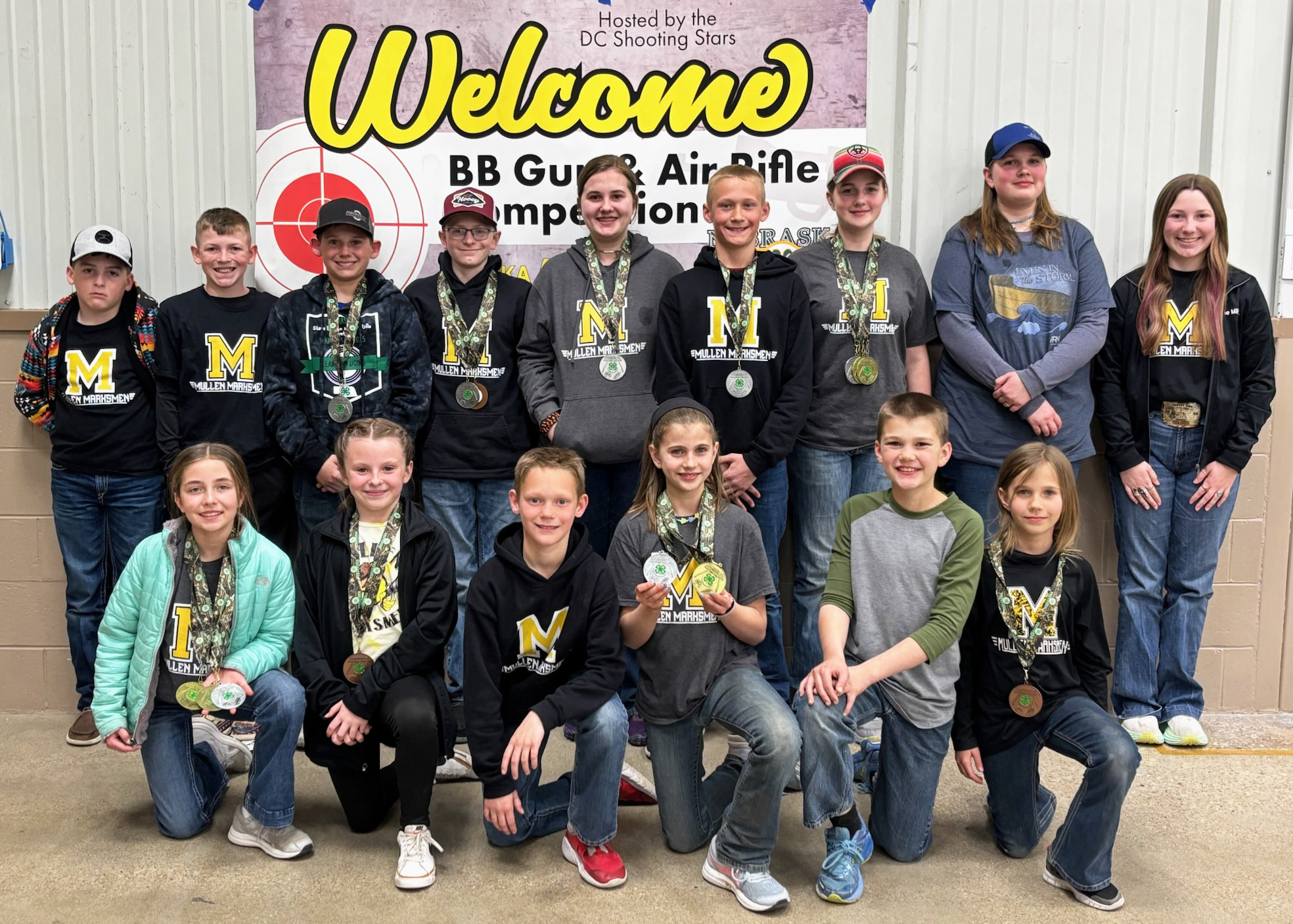 Mullen Marksmen competing at State BB Gun &amp; Air Rifle, back l-r: Zach Hicks, Duke Miller, Colin Connealy, Oakes Miller, Jessa O’Brien, Teal Peterson, Adelyn O’Brien, Hannah O’Brien, Hope Miller. Front: Lillian Ericksen, Sadie Hoyt, Eli Barnes, Rainne O’Brien, Ransom O’Brien, Aleah O’Brien. Not pictured: Marcus Lattin. Gerri Peterson