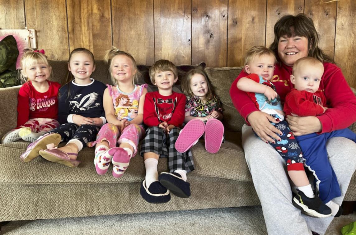 L-r: Violet Stichka, Brogan Jewell, Danielle Peterson, Merick Lattin, Aurora Polt, Lori Folk holding Chasin McIntosh and Arthur Polt. Gerri Peterson
