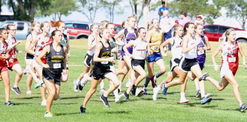 Bronco cross country girls Callie Coble (left) and Peyton Paxton begin their race at Ainsworth last week. Sue Licking