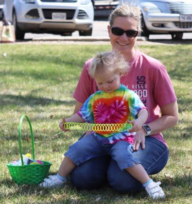 Gabriella Peters decided she had gathered enough Easter goodies and sat on her grandma Kristi Daniels’ lap to check out her finds!