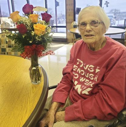 Marlene Dykes with her Valentine’s Day flowers.