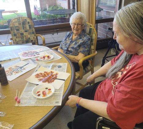 Nadene Andersen and Ann Connell during craft time a couple weeks ago.