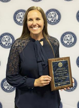 Gerri Peterson with her fist place award in Detroit last week. Shelby Pitzer