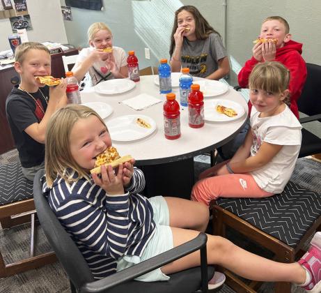 Pictured clockwise around the table from front left: Ella Walz, Eli Barnes, Ava Walz, Ava Kvanvig, Duke Miller, Aislynn Connealy. Brett Mauler