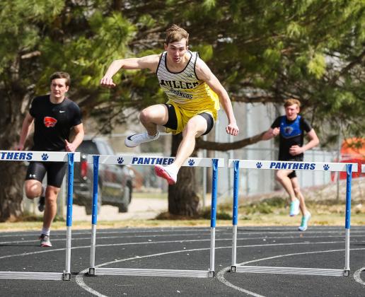 Cayden Hampton on his way to the gold in the 300 hurdles. Megan Andersen