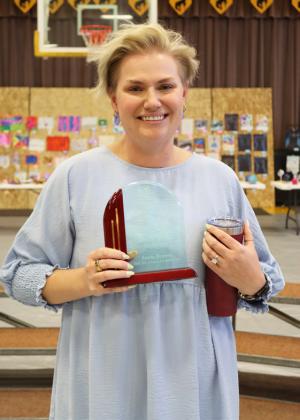Emily Brown was honored at the Mullen Elementary Awards Night for her 12 years of service as the 2nd grade teacher and received a standing ovation. She will be moving at the end of this school year. Gerri Peterson