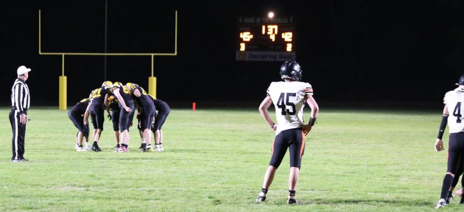 The Broncos huddle up in the last 1:37 left of the game last Friday night. Carolee Brown
