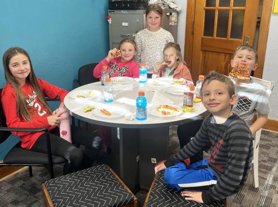 Pictured clockwise around the table from the left: Lillian Ericksen, Sadie Hoyt, Aislynn Connealy, Emerson Phipps, Tate Phillips, Austin Smith. Brett Mauler