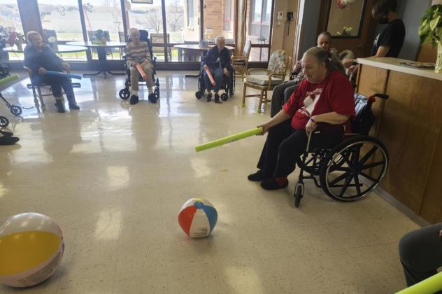 Playing noodle ball.
