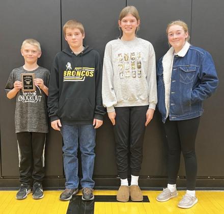 Spelling Bee class champions, l-r: Weston Ourada (overall champion), Justin Kraus, Chloe Newman, Kassidy Cheever. Mike Kvanvig
