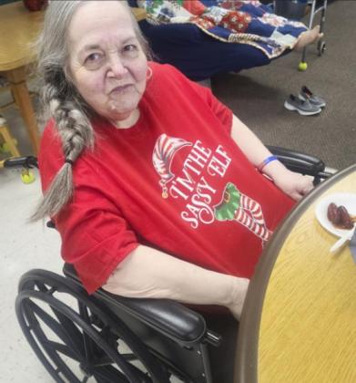 Ann Connell with her adorable shirt, “I’m the sassy elf.”