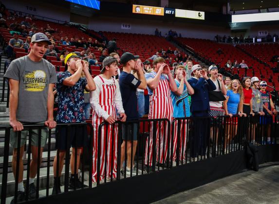Some of the student section cheering on the Lady Broncos last Thursday at the State Volleyball Tournament.