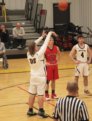 Mullen Bronco basketball action
