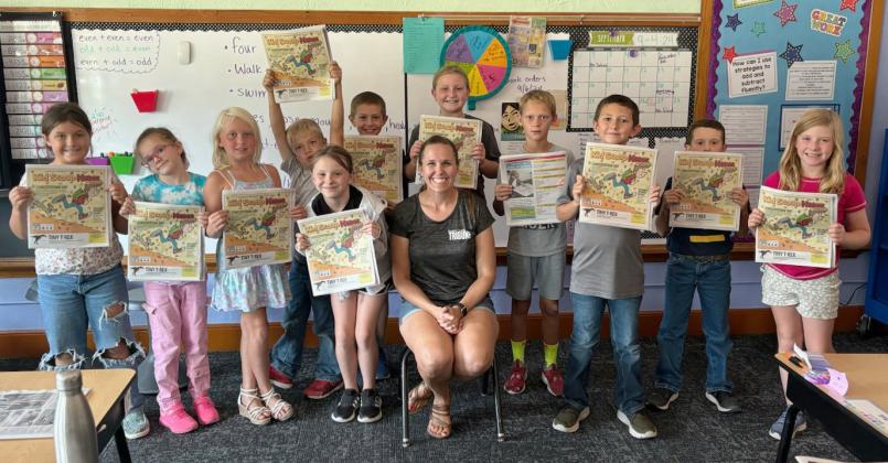 Mullen 3rd graders with their Kid Scoop News, l-r: Zandra Hebbert, Anna Hessin, Daryl Deibler, Killian Kearns, Sadie Hoyt, Grady Phipps, Gerri Peterson, Tatum Deibler, Eli Barnes, Marcus Lattin, Holt Morrison, Marki Finney. Krista Schoonveld