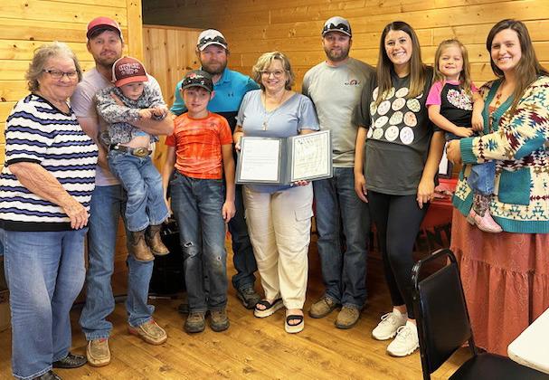 Judy Mulligan is pictured surrounded by her family at her retirement party. courtesy photo